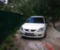 Белый Мицубиси Лансер, объемом двигателя 1.6 л и пробегом 220 тыс. км за 6000 $, фото 1 на Automoto.ua