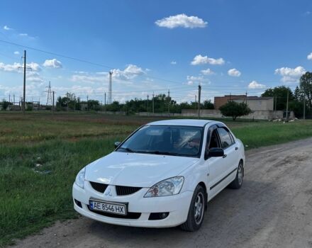 Білий Міцубісі Lancer, об'ємом двигуна 1.6 л та пробігом 198 тис. км за 4463 $, фото 4 на Automoto.ua