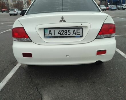 Белый Мицубиси Лансер, объемом двигателя 1.6 л и пробегом 306 тыс. км за 3000 $, фото 3 на Automoto.ua