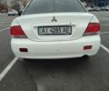 Белый Мицубиси Лансер, объемом двигателя 1.6 л и пробегом 306 тыс. км за 3000 $, фото 3 на Automoto.ua