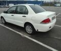 Белый Мицубиси Лансер, объемом двигателя 1.6 л и пробегом 306 тыс. км за 3000 $, фото 4 на Automoto.ua