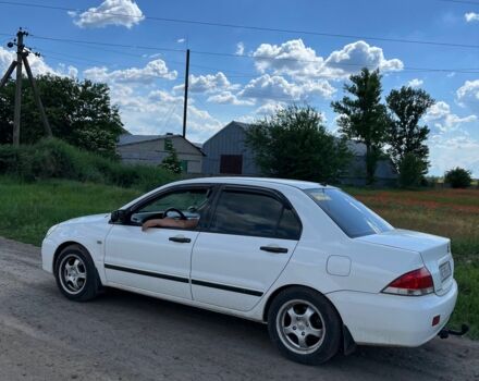Білий Міцубісі Lancer, об'ємом двигуна 1.6 л та пробігом 198 тис. км за 4463 $, фото 6 на Automoto.ua