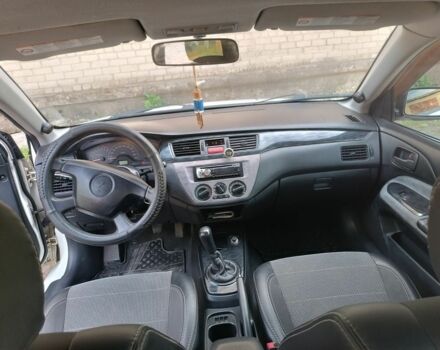 Білий Міцубісі Lancer, об'ємом двигуна 1.6 л та пробігом 198 тис. км за 4463 $, фото 7 на Automoto.ua