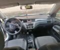 Білий Міцубісі Lancer, об'ємом двигуна 1.6 л та пробігом 198 тис. км за 4463 $, фото 7 на Automoto.ua
