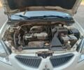 Білий Міцубісі Lancer, об'ємом двигуна 1.6 л та пробігом 198 тис. км за 4463 $, фото 11 на Automoto.ua