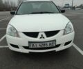 Белый Мицубиси Лансер, объемом двигателя 1.6 л и пробегом 306 тыс. км за 3000 $, фото 6 на Automoto.ua