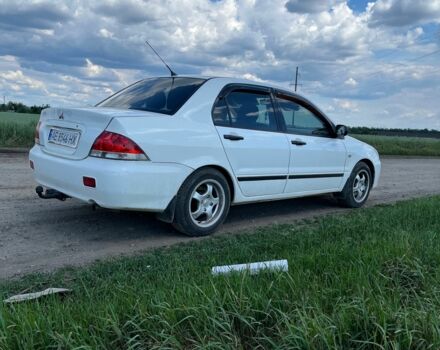 Білий Міцубісі Lancer, об'ємом двигуна 1.6 л та пробігом 198 тис. км за 4463 $, фото 1 на Automoto.ua