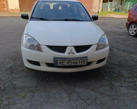 Білий Міцубісі Lancer, об'ємом двигуна 1.6 л та пробігом 198 тис. км за 4463 $, фото 14 на Automoto.ua