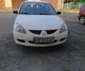 Білий Міцубісі Lancer, об'ємом двигуна 1.6 л та пробігом 198 тис. км за 4463 $, фото 14 на Automoto.ua