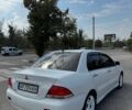 Білий Міцубісі Lancer, об'ємом двигуна 1.6 л та пробігом 339 тис. км за 3999 $, фото 8 на Automoto.ua