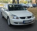 Білий Міцубісі Lancer, об'ємом двигуна 1.6 л та пробігом 400 тис. км за 4100 $, фото 6 на Automoto.ua