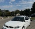 Білий Міцубісі Lancer, об'ємом двигуна 1.6 л та пробігом 339 тис. км за 3999 $, фото 2 на Automoto.ua