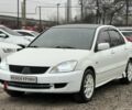 Білий Міцубісі Lancer, об'ємом двигуна 1.6 л та пробігом 301 тис. км за 3300 $, фото 3 на Automoto.ua