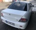 Білий Міцубісі Lancer, об'ємом двигуна 0.16 л та пробігом 216 тис. км за 2950 $, фото 10 на Automoto.ua