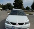 Білий Міцубісі Lancer, об'ємом двигуна 1.6 л та пробігом 339 тис. км за 3999 $, фото 1 на Automoto.ua