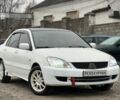 Білий Міцубісі Lancer, об'ємом двигуна 1.6 л та пробігом 301 тис. км за 3300 $, фото 1 на Automoto.ua