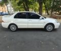 Білий Міцубісі Lancer, об'ємом двигуна 1.6 л та пробігом 400 тис. км за 4100 $, фото 5 на Automoto.ua