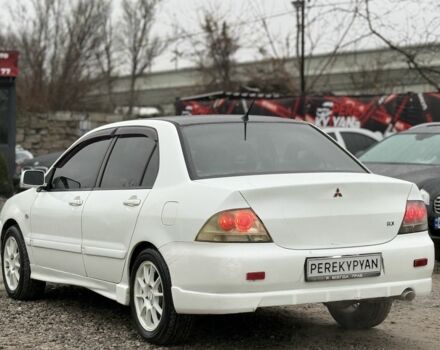 Білий Міцубісі Lancer, об'ємом двигуна 1.6 л та пробігом 301 тис. км за 3300 $, фото 4 на Automoto.ua