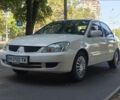 Білий Міцубісі Lancer, об'ємом двигуна 1.6 л та пробігом 400 тис. км за 4100 $, фото 1 на Automoto.ua