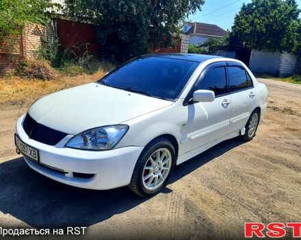 Белый Мицубиси Лансер, объемом двигателя 1.6 л и пробегом 296 тыс. км за 3500 $, фото 3 на Automoto.ua
