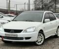 Білий Міцубісі Lancer, об'ємом двигуна 1.6 л та пробігом 301 тис. км за 3300 $, фото 1 на Automoto.ua