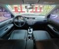 Білий Міцубісі Lancer, об'ємом двигуна 1.6 л та пробігом 400 тис. км за 4100 $, фото 10 на Automoto.ua