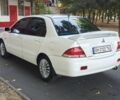 Білий Міцубісі Lancer, об'ємом двигуна 1.6 л та пробігом 400 тис. км за 4100 $, фото 2 на Automoto.ua