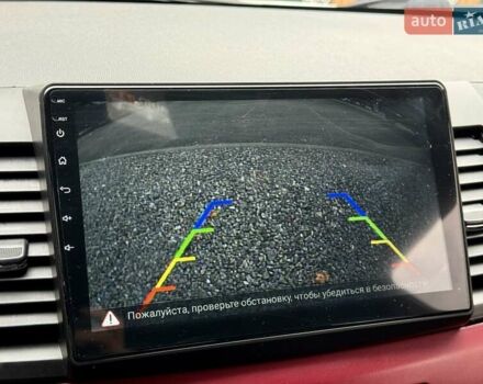 Білий Міцубісі Lancer, об'ємом двигуна 2 л та пробігом 170 тис. км за 6900 $, фото 18 на Automoto.ua