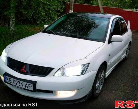 Білий Міцубісі Lancer, об'ємом двигуна 1.6 л та пробігом 250 тис. км за 4700 $, фото 4 на Automoto.ua