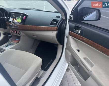 Белый Мицубиси Лансер, объемом двигателя 1.5 л и пробегом 314 тыс. км за 6500 $, фото 19 на Automoto.ua