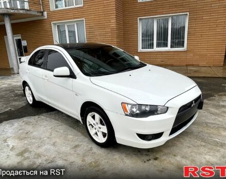 Белый Мицубиси Лансер, объемом двигателя 2 л и пробегом 224 тыс. км за 7400 $, фото 1 на Automoto.ua