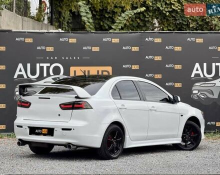Білий Міцубісі Lancer, об'ємом двигуна 2 л та пробігом 170 тис. км за 6900 $, фото 7 на Automoto.ua