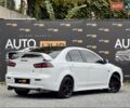 Білий Міцубісі Lancer, об'ємом двигуна 2 л та пробігом 170 тис. км за 6900 $, фото 7 на Automoto.ua