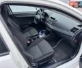 Белый Мицубиси Лансер, объемом двигателя 2 л и пробегом 260 тыс. км за 6700 $, фото 11 на Automoto.ua