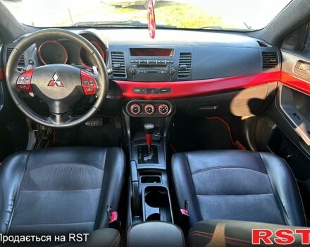Білий Міцубісі Lancer, об'ємом двигуна 2 л та пробігом 165 тис. км за 5800 $, фото 9 на Automoto.ua