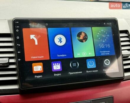 Білий Міцубісі Lancer, об'ємом двигуна 2 л та пробігом 170 тис. км за 6900 $, фото 17 на Automoto.ua