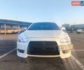 Білий Міцубісі Lancer, об'ємом двигуна 2 л та пробігом 172 тис. км за 6950 $, фото 1 на Automoto.ua