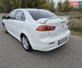 Міцубісі Lancer 2007 у Павлограде на Automoto.ua Білий Міцубісі Lancer, об'ємом двигуна 2 л та пробігом 62 тис. км за 7200 $, фото 2 на Automoto.ua