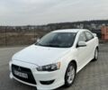 Білий Міцубісі Lancer, об'ємом двигуна 2 л та пробігом 215 тис. км за 7700 $, фото 1 на Automoto.ua