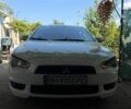 Білий Міцубісі Lancer, об'ємом двигуна 2 л та пробігом 115 тис. км за 5000 $, фото 1 на Automoto.ua