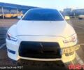 Білий Міцубісі Lancer, об'ємом двигуна 2 л та пробігом 172 тис. км за 7350 $, фото 1 на Automoto.ua