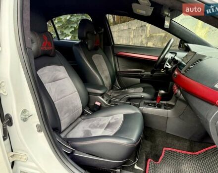 Білий Міцубісі Lancer, об'ємом двигуна 2 л та пробігом 170 тис. км за 6900 $, фото 12 на Automoto.ua