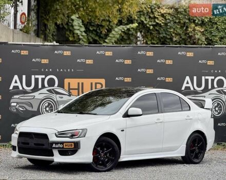 Білий Міцубісі Lancer, об'ємом двигуна 2 л та пробігом 170 тис. км за 6900 $, фото 2 на Automoto.ua