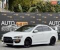 Білий Міцубісі Lancer, об'ємом двигуна 2 л та пробігом 170 тис. км за 6900 $, фото 2 на Automoto.ua