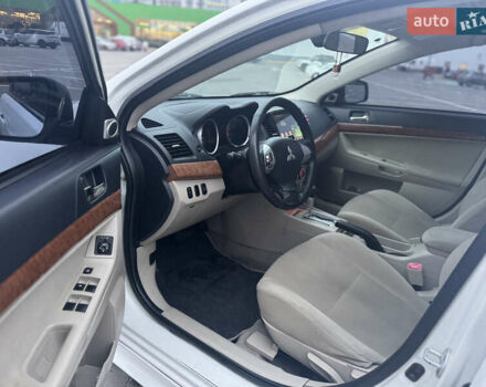 Белый Мицубиси Лансер, объемом двигателя 1.5 л и пробегом 314 тыс. км за 6500 $, фото 20 на Automoto.ua