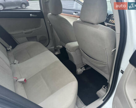 Белый Мицубиси Лансер, объемом двигателя 1.5 л и пробегом 314 тыс. км за 6500 $, фото 16 на Automoto.ua