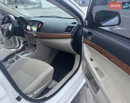 Белый Мицубиси Лансер, объемом двигателя 1.5 л и пробегом 314 тыс. км за 6500 $, фото 22 на Automoto.ua