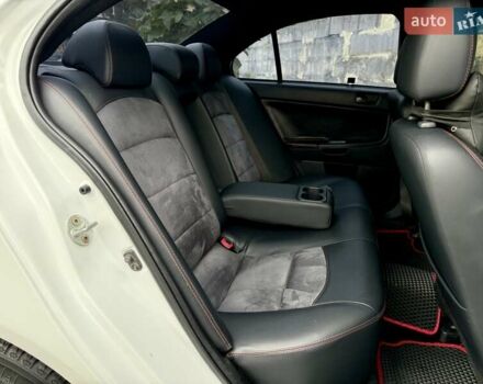 Білий Міцубісі Lancer, об'ємом двигуна 2 л та пробігом 170 тис. км за 6900 $, фото 11 на Automoto.ua