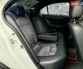 Білий Міцубісі Lancer, об'ємом двигуна 2 л та пробігом 170 тис. км за 6900 $, фото 11 на Automoto.ua