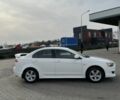 Білий Міцубісі Lancer, об'ємом двигуна 2 л та пробігом 215 тис. км за 7700 $, фото 3 на Automoto.ua